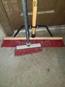 lot 4001 image: Brooms 2. 1 is a push broom and the other is a regular broom