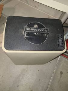 lot 4006 image: SENTRY SURVIVOR Safe 17 tall x 8.5 wide x 13 deep