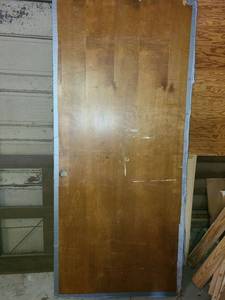 lot 4021 image: Door. 81 tall x 3ft wide x 1 12 deep. One side has carpet on it . Damaged