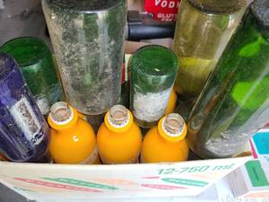 lot 4041 image: ARTS AND CRAFTS. Colored Bottles. GREAT for a DIY Bottle Tree