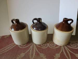 lot 4085 image: OLD Liquor Crock Jugs. Grandmas ELIXIR  Jugs. 1 is cracked, and another has a chip