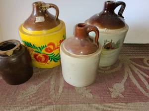 lot 4086 image: OLD Liquor Jugs, Grandmas ELIXAR Jugs. 2 are painted Smallest is chipped