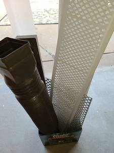 lot 4094 image: Gutter Covers and a Drain Extender.