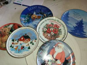 lot 4102 image: Christmas Plates. Variety Plates are hung up