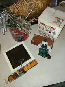 lot 4111 image: Miscellaneous Craft stuff. Concrete, Rope for Macrame, Yard Stakes, and clown and creepy head