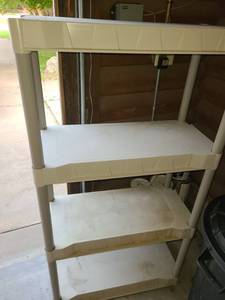 lot 4131 image: 4 Shelves. Plastic Shelving Unit. This item has been in garage