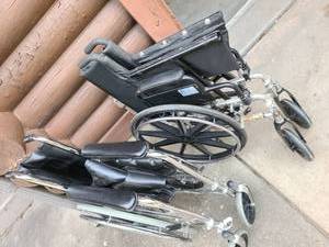 lot 4137 image: WHEELCHAIRS. 2 in total. The Chair on the Left Side...Seat... is approximately 17 wide and the other is approximately 21 wide. That one also has reinforced bars underneath