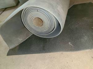 lot 5030 image: LARGE Roll of Rubbery Foam. With 2 pieces approximately 34 x 24