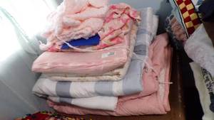 lot 9600 image: PILE OF BLANKETS ETC.