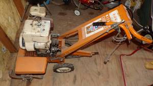lot 9725 image: GARDEN TILLER - NEEDS HANDLE REPAIR