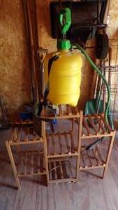lot 9740 image: SPRAYER AND PLANT STAND