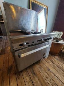 lot 8003 image: stove. 4 burner gas stove with flatop & oven