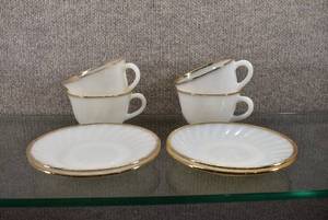 lot 1395 image: Lot of 4 Vintage Fire King Cup & Saucer Gold Trim Milk Glass  Made in USA  Cups - 2.5 Tall  Saucers - 5.75 Wide