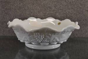 lot 1431 image: Vintage Westmoreland Milk Glass Grape and Leaf Bowl  Has original Westmorland Retail Sticker and foil sticker.  10