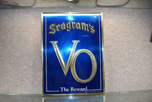 lot 1530 image: Vintage Seagrams VO The Reward Glass Framed Bar Sign  15 x 20