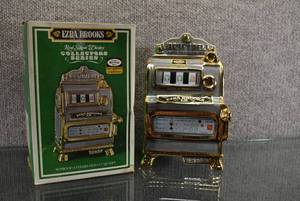 lot 1531 image: Vintage Ezra Brooks 1971 Slot Machine Decanter Hand Decorated 24K Gold  Heritage China SN-14  8 Tall