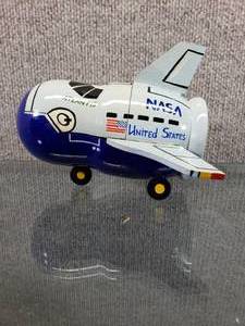 lot 1545 image: Vintage 1999 NASA Atlantis Capsule Toy  Paint Cracking on Fin  Made in Russia  6 Tall