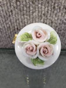lot 1558 image: Vintage Trinket box w Cross Necklace  Blue stone necklace. Porcelain Box.