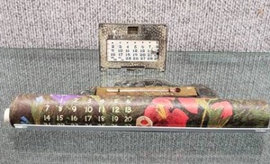 lot 1566 image: Vintage 1973 Calendar, Metal Calendar and Alligator Thermometer