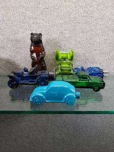 lot 1567 image: Vintage Avon Cologne Bottles Cars and Kodiak Bear  Bottles are Empty