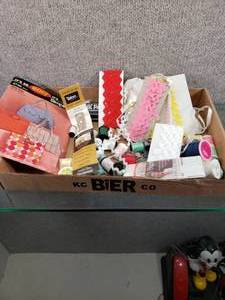 lot 1568 image: Vintage Box of Sewing Notion  Patterns, Threads, Zippers, Accent Ribbons