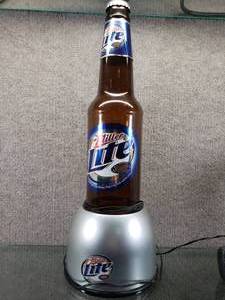 lot 1584 image: Vintage Miller Lite Beer Bubble Cap Light  Add Distilled Water and Plug In (Caps Bubble throughout Light)  20 12 Tall