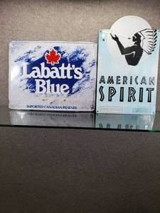 lot 1602 image: Lot of 2 Advertising Metal Signs American Spirit & Labatts Blue  14 x 18 & 19 x 12