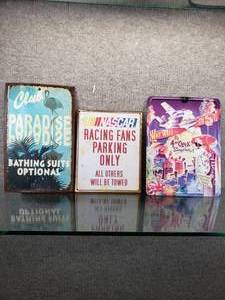 lot 1605 image: Lot of 3 Metal Signs  Nascar, Club Paradise, 5 OClock Somewhere  Various sizes