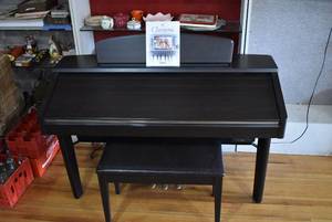 lot 1314 image: Yamaha Clavinova CVP-207 Digital Upright Piano  Includes Bench with Storage, Manuals, Software & Some Accessories  A & B Keys in the Center Stick, Otherwise Works  56 W x 24.5 L x 36 T  - LOCAL PICKUP ONLY