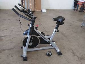 lot 3922 image: YOSUDA Indoor Cycling Bike Stationary - Cycle Bike with Ipad Mount & Comfortable Seat Cushion
