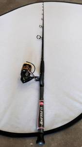 lot 1142 image: Penn Battle II Size 6000 7-Feet Medium Heavy Spinning Combo Rod & Reel