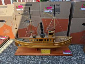 lot 2950 image: Seguin Tugboat decor