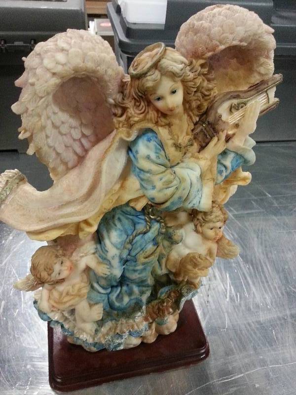 lot 1031 image: Cool looking angle statue about 12 tall and a wood base 6 wide pretty colors and piece