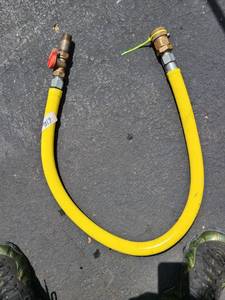 lot 9017 image: gas hose with 34 inch valves