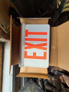 lot 9150 image: Lot of (4)  illuminating exit signs   ATTENTION ALL LOTS BEYOND THIS POINT HAVE A SEPARATE PICKUP LOCATION AND DATE
