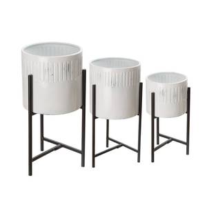 lot 511001 image: Glitzhome Washed White Metal Plant Stands Set of 3