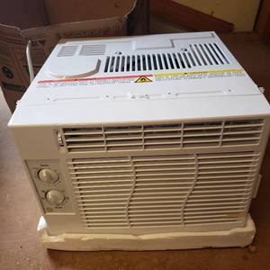 lot 66 image: Ge 5,000 Btu Mechanical Window Air Conditioner In White, Ael05lx