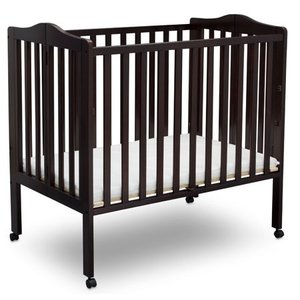 lot 61224 image: Delta Children Folding Portable Mini Crib with Mattress Espresso (POSSIBLY MISSING HARDWARE)