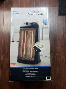 lot 2594 image: Mainstays Quartz Electric Tower Space Heater, Indoor, Black,