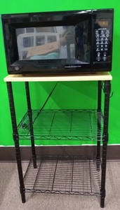 lot 7839 image: GE� 1.0 Cu. Ft. Capacity Countertop Microwave with Stand