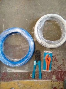 lot 7867 image: PEX Tool Kit Cutting Tool, Crimper, and Hose