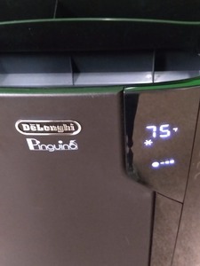 lot 7886 image: DeLonghi 500 Square Foot Portable Air Conditioner in Black