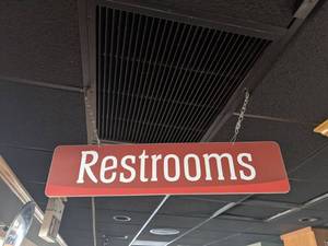 lot 7047 image: Restroom Signs, Buyer Responsible For Removal