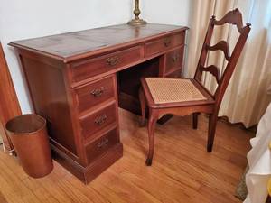 lot 1137 image: Leather Top Cherry Executive Desk with Cane Back Chair