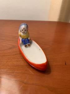 lot 6214 image: Made in Japan Native American Girl in Canoe Location Mantel