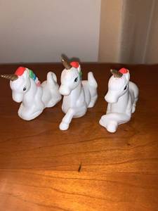 lot 6215 image: 3 Little Unicorn Porcelain Figures Location Mantel