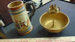 lot 10012 image: Beer stein - gold bowl wcandle holder