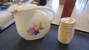 lot 10017 image: Pitcher and mini saucers