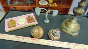 lot 10036 image: old metal toy tops - brass candle stick - perfume