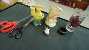 lot 10054 image: tiki bank - Fancy lady vase - scissors